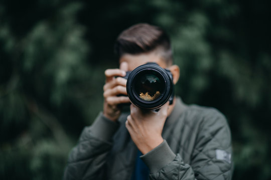 Young Man Taking Photos