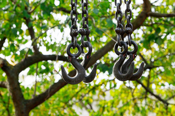 Obraz premium Crane hooks for lifting goods