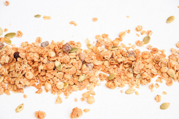 Crispy muesli dry Breakfast isolated on white background selective focus, top view