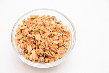 Crispy muesli dry Breakfast isolated on white background selective focus, top view