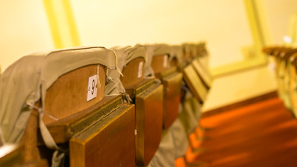 old theater chairs with number and small table