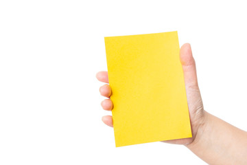 Hands caught in yellow paper
