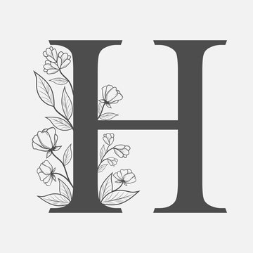 Uppercase Letter H with flowers and branches. Vector flowered monogram or logo. Hand Drawn concept. Botanical design branding. Composition of letter and flowers for wedding card, invitations, brand