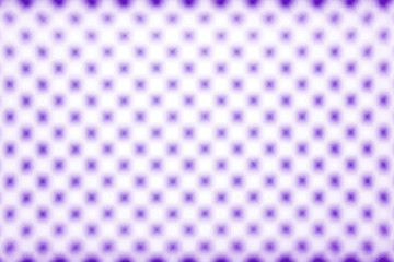 futuristic simple background: Light penetrating through symmetrical holes, defocusing, blurring, bokeh, toning purple color