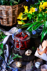 Sun dried tomato on the spring background
