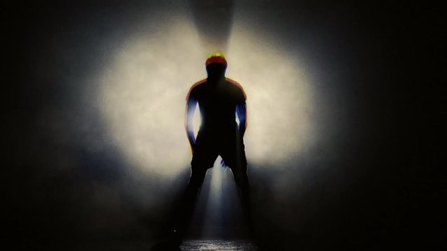 Training Presses in Smoky Studio. Silhouette on Dark background