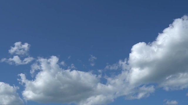Only summer blue sky with fast moving metamorphic white clouds. Full HD Time Lapse footage