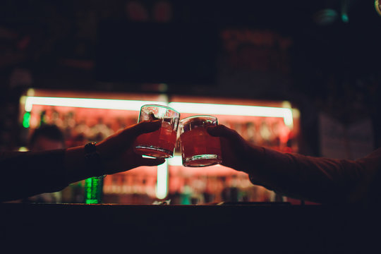 people celebrate. Clink glasses with the drink.