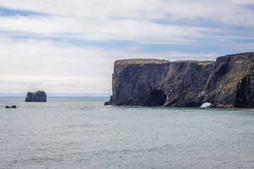 Fototapeta na wymiar Famous rock of Dyrholaey foreland located on the south coast of Iceland