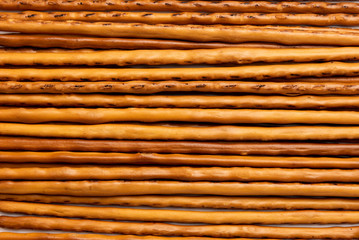 Cracker pretzel sticks isolated on white background.