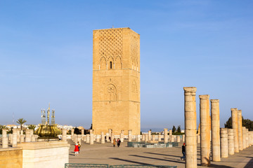 Fototapeta na wymiar Rabat, Morocco - February 22.2019: Rabat's Hassan Tower and the incomplete Mosque pillars.