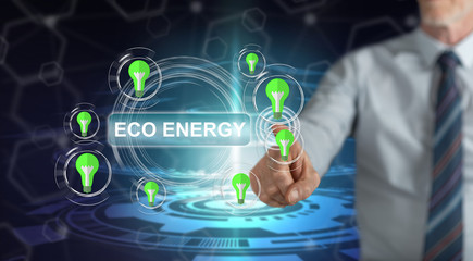 Man touching an eco energy concept