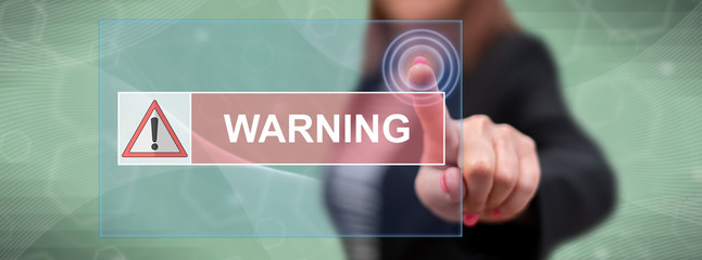 Woman touching a warning concept