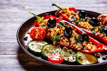 Pepper stuffed with groats and vegetables