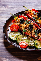 Pepper stuffed with groats and vegetables