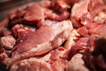 Fresh raw pork chopped in pieces