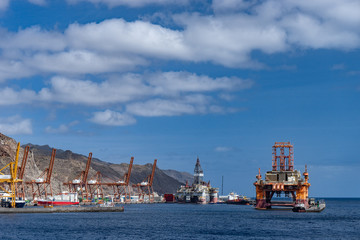 Fototapeta premium Oil rig platform at dawn in the port of Santa Cruz de Tenerife Canary Islands Spain. Anaga mountains in background