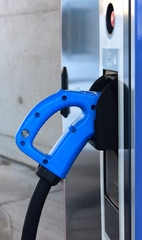 Charging station connector