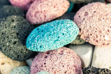 Multi-colored pumice stones for the whole frame. Selective focus