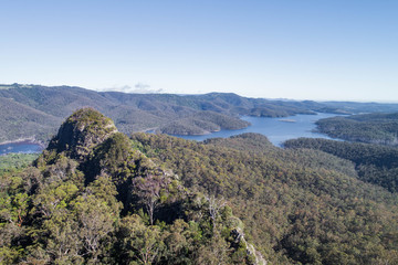 Fototapeta na wymiar Pages Pinnacle aerial view with Hinze Dam in the background