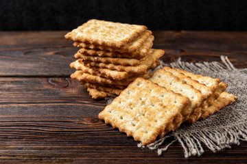 Cracker cookies with sesame isolated on white background.