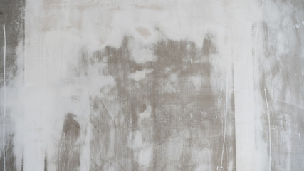Wall in white paint during repair. Background texture.