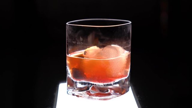 Slider shot, Old Fashioned with light underneath, ready to be served.