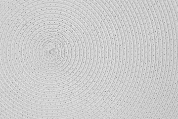 Woven white wicker straw background or texture