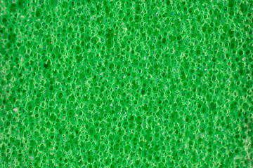 Macro of green abrasive sponge work item isolated