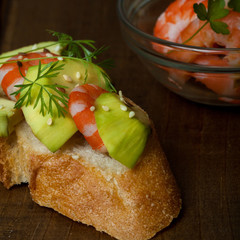 Bruschetta with shrimps and avocado.