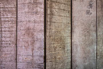 Background textures or old wooden wallpapers laid the vertical, gray and light brown painted in retro style.