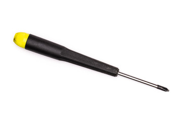 One whole square screwdriver with a yellow black plastic handle work item flatlay isolated on white background