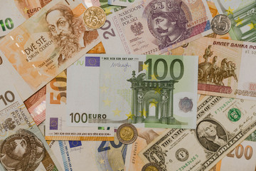 Various paper money euro and dollar banknotes as background. many different currencies as colorful background concept global money.