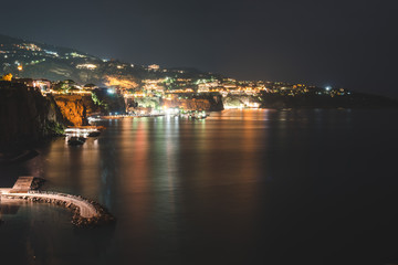 Obraz premium Night view of Sorrento, Italy. Travel background