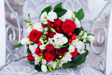 Wedding bouquet of white and red roses