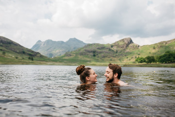 Couple swimming together