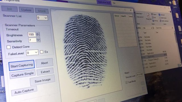 video of a real and real time fingerprint sensor at a processing software