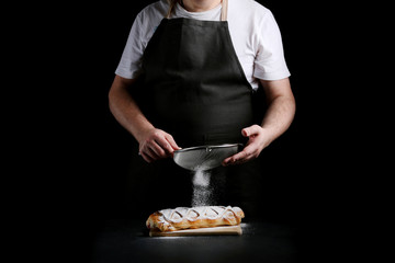 pie on dark with hand. concept of decorating bakery. pie making concept