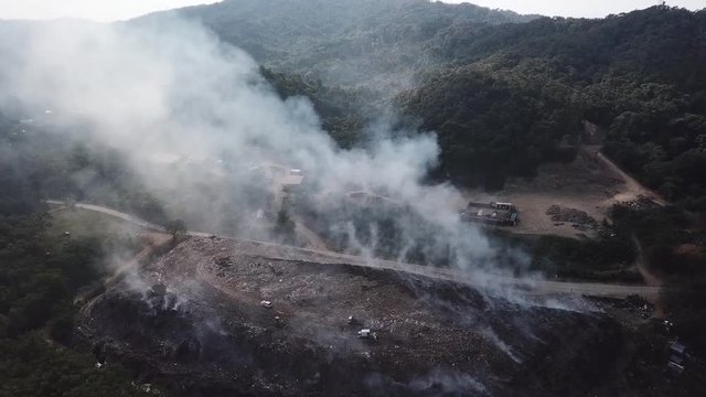 Roatan Honduras burning garbage.