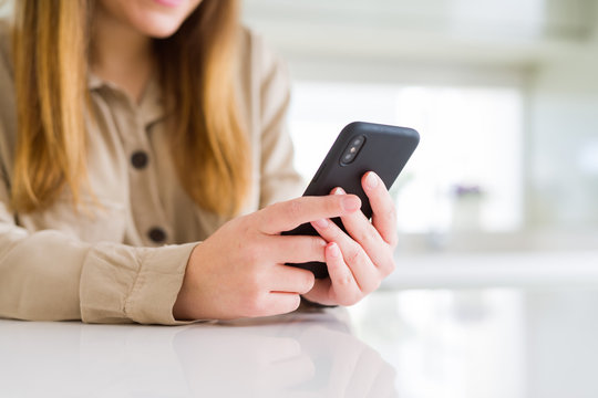 Close up of woman using smartphone