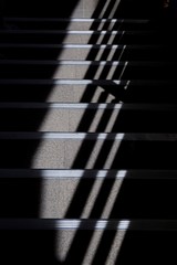 overpass stairs in the city with light and shadow