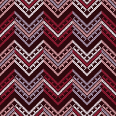 Ethnic boho seamless pattern. Zigzag. Embroidery on fabric. Patchwork texture. Weaving. Traditional ornament. Tribal pattern. Folk motif. Can be used for wallpaper, textile, invitation card, wrapping,