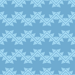Fototapeta premium Ethnic boho seamless pattern. Zigzag. Embroidery on fabric. Patchwork texture. Weaving. Traditional ornament. Tribal pattern. Folk motif. Can be used for wallpaper, textile, invitation card, wrapping,