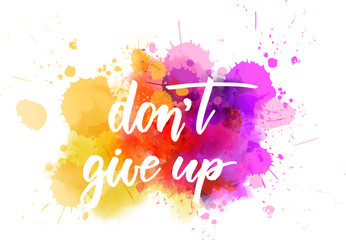 Don't give up - handwritten lettering on watercolor splash