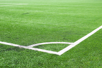 Obraz premium White line corner on the green soccer field