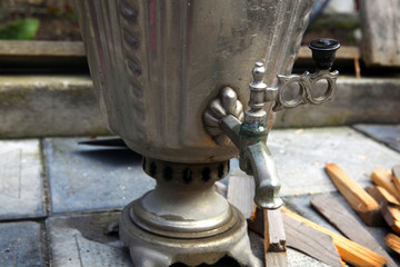 Russian samovar for tea in the yard. 