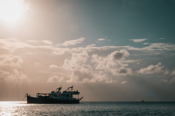Boat at Sunset, Nassau, The Bahamas.