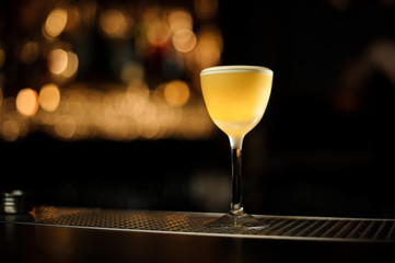 Close-up of an alocohol cocktail on the bar counter