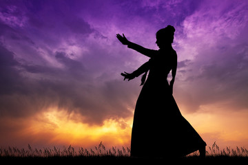 Indian dance at sunset