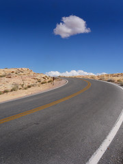 Single cloud over a road in the Valley of Fire, Nevada